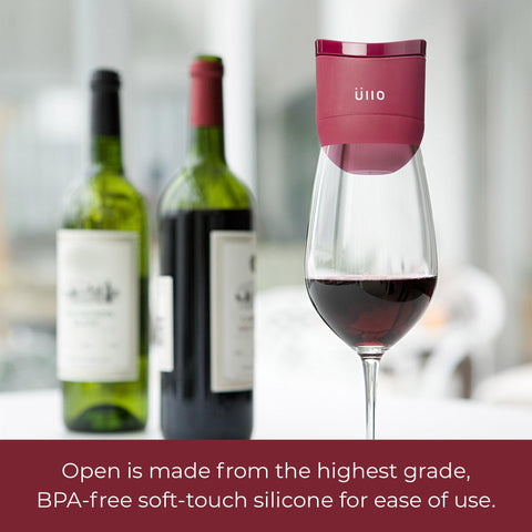 Üllo Open in use pouring through purifier into glass for immediate improvement