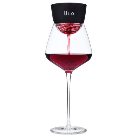 Üllo next to wine bottle for scale helping visualize size and portability