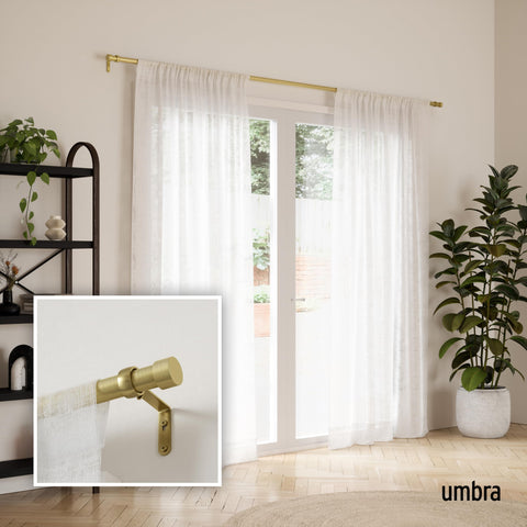 Umbra Cappa close-up of finial detail showing gold finish and modern accent
