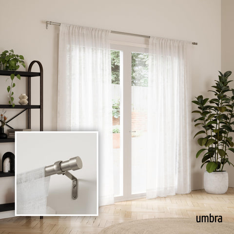 Umbra Cappa finial close-up in nickel, shows decorative end and secure fit