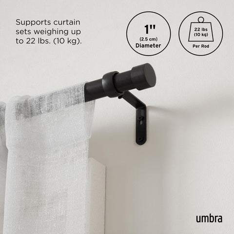 Umbra Cappa mounted with curtains demonstrating easy installation and clean visual impact