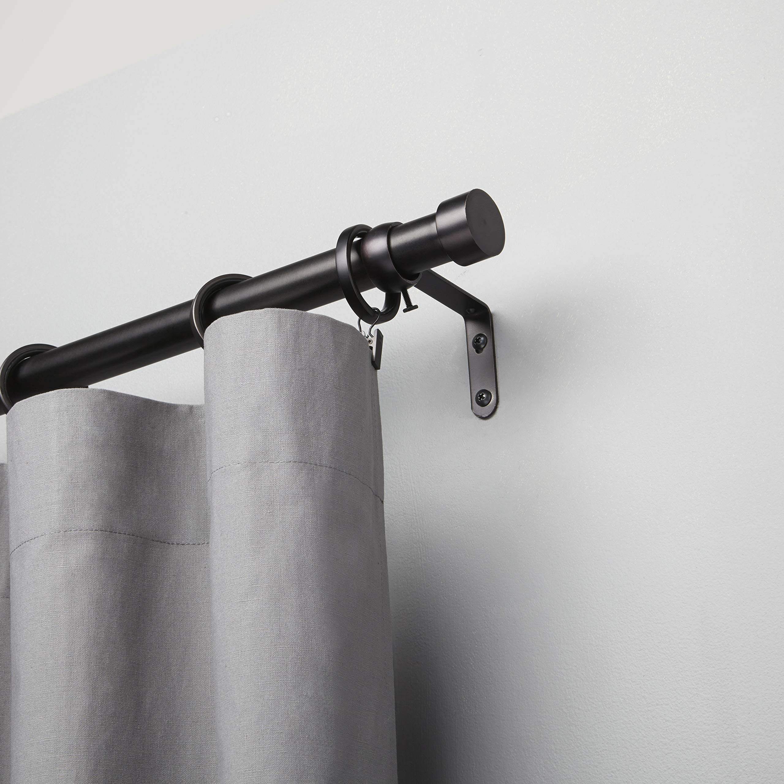 Umbra Cappa scale with tape measure demonstrating adjustable 36 to 66 inch range