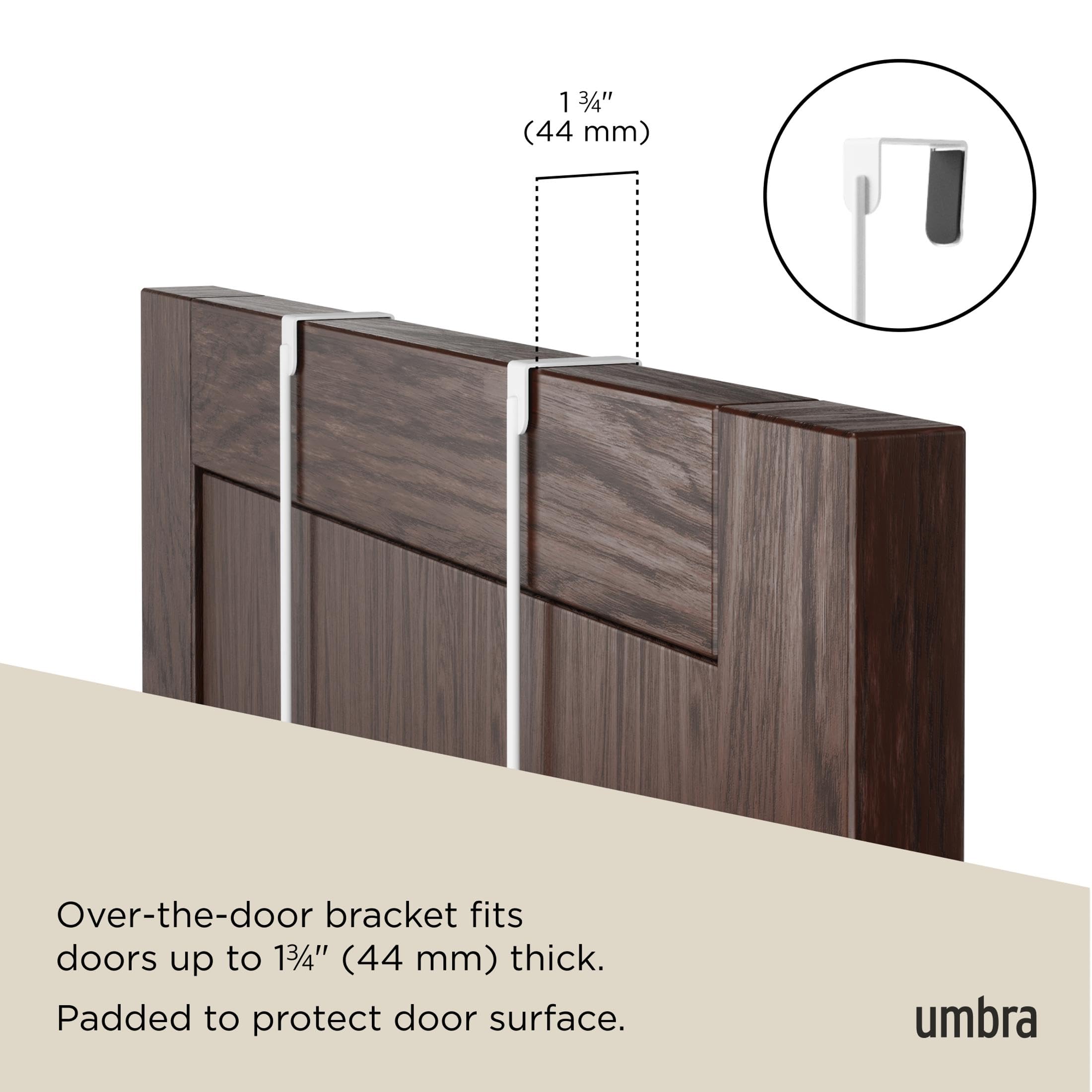 umbra Estique holding coats and bags demonstrating organized entryway benefit