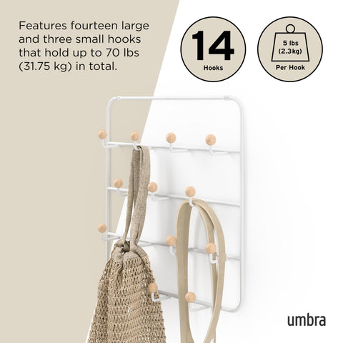umbra Estique next to door frame showing size and capacity clarity benefit