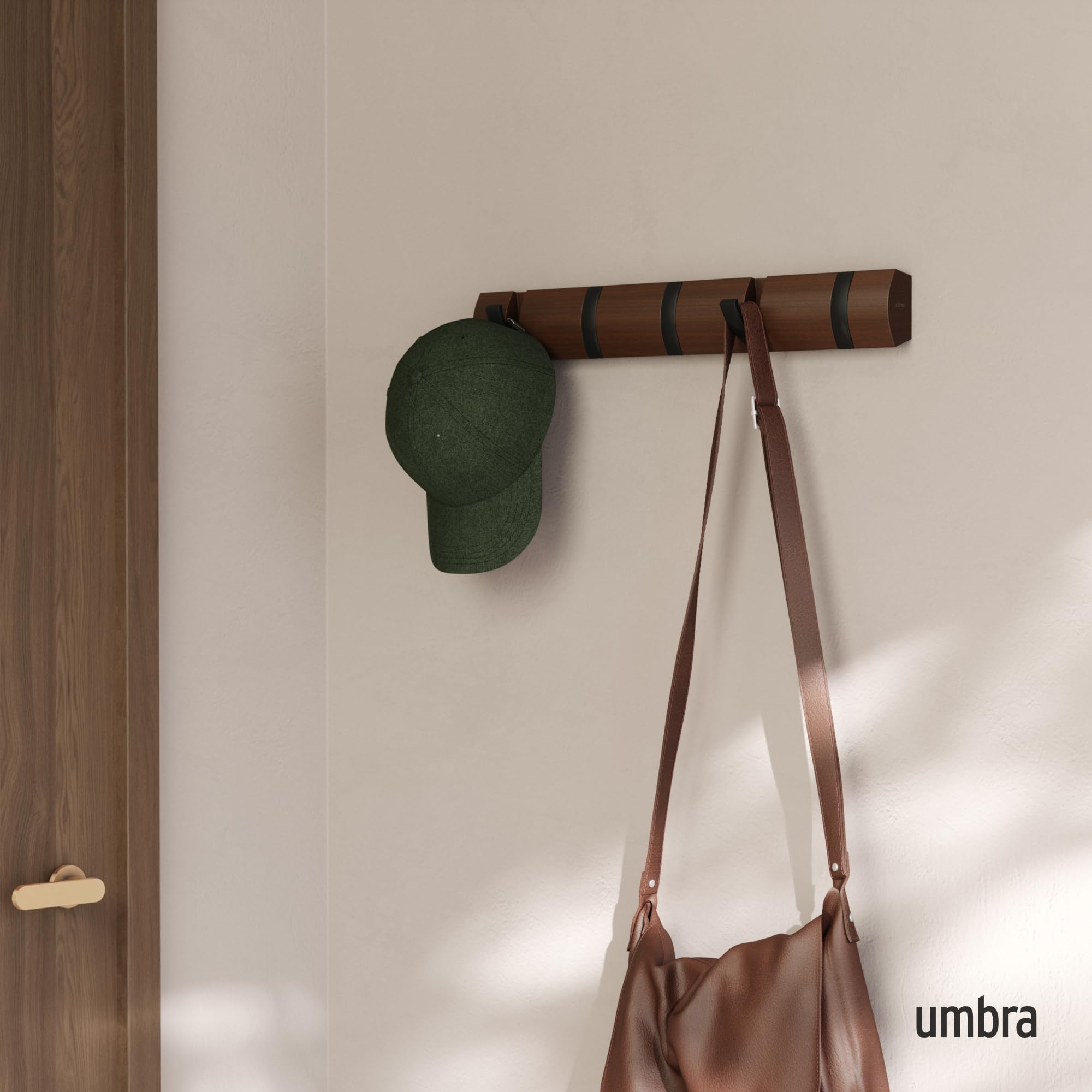 Umbra Flip closeup of extended hooks demonstrating secure hanging