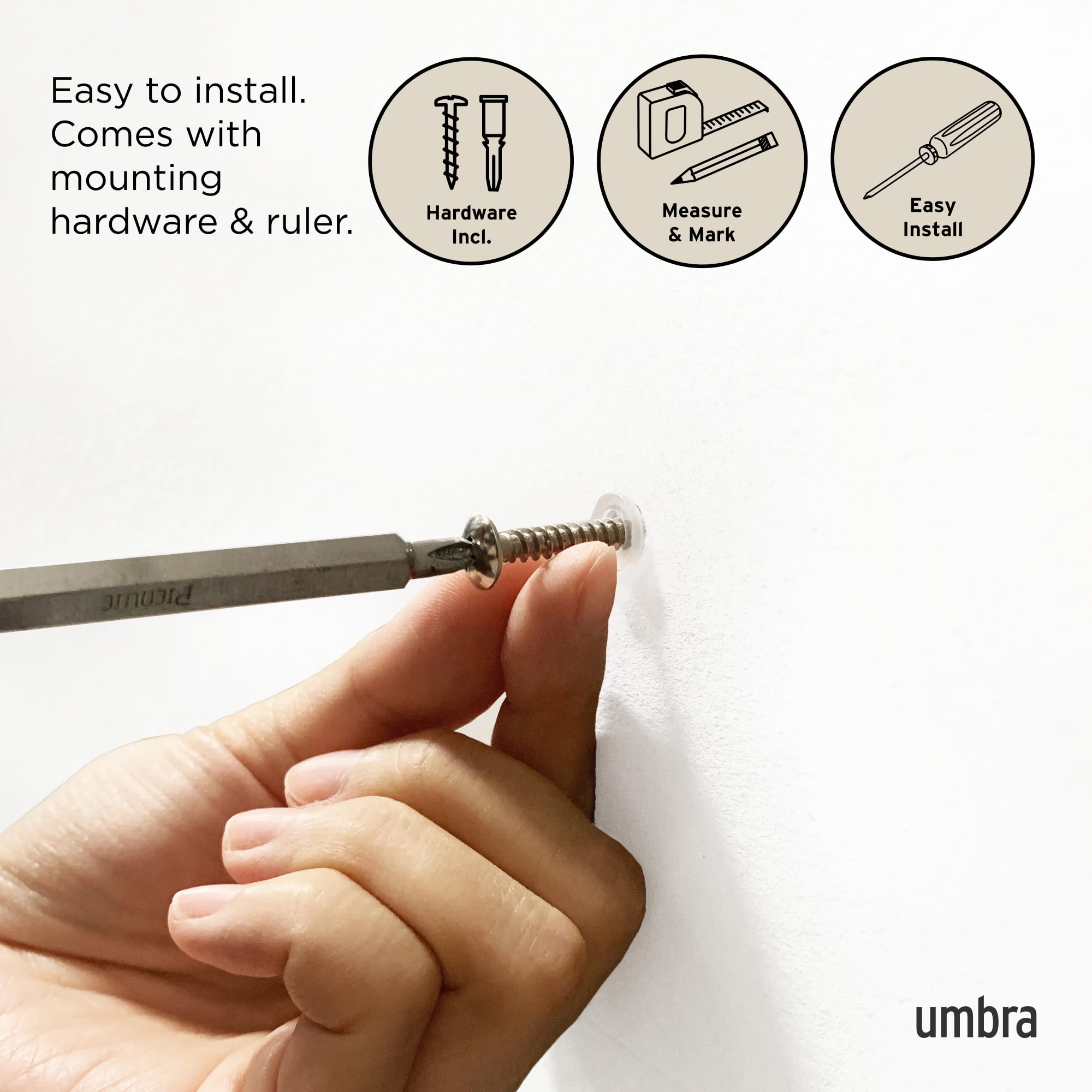 Umbra Flip holding coats and bags for organized, accessible storage