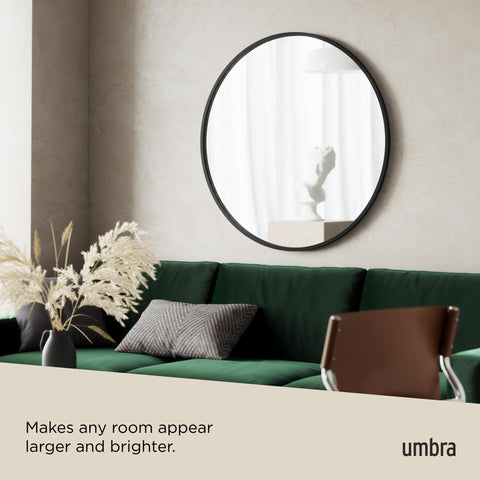 Umbra Hub over entryway console, creates welcoming larger-feel space