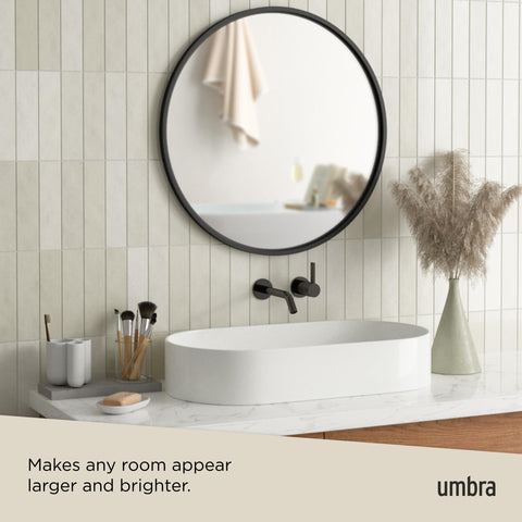 Umbra Hub over console in living room adding depth and stylish focal point
