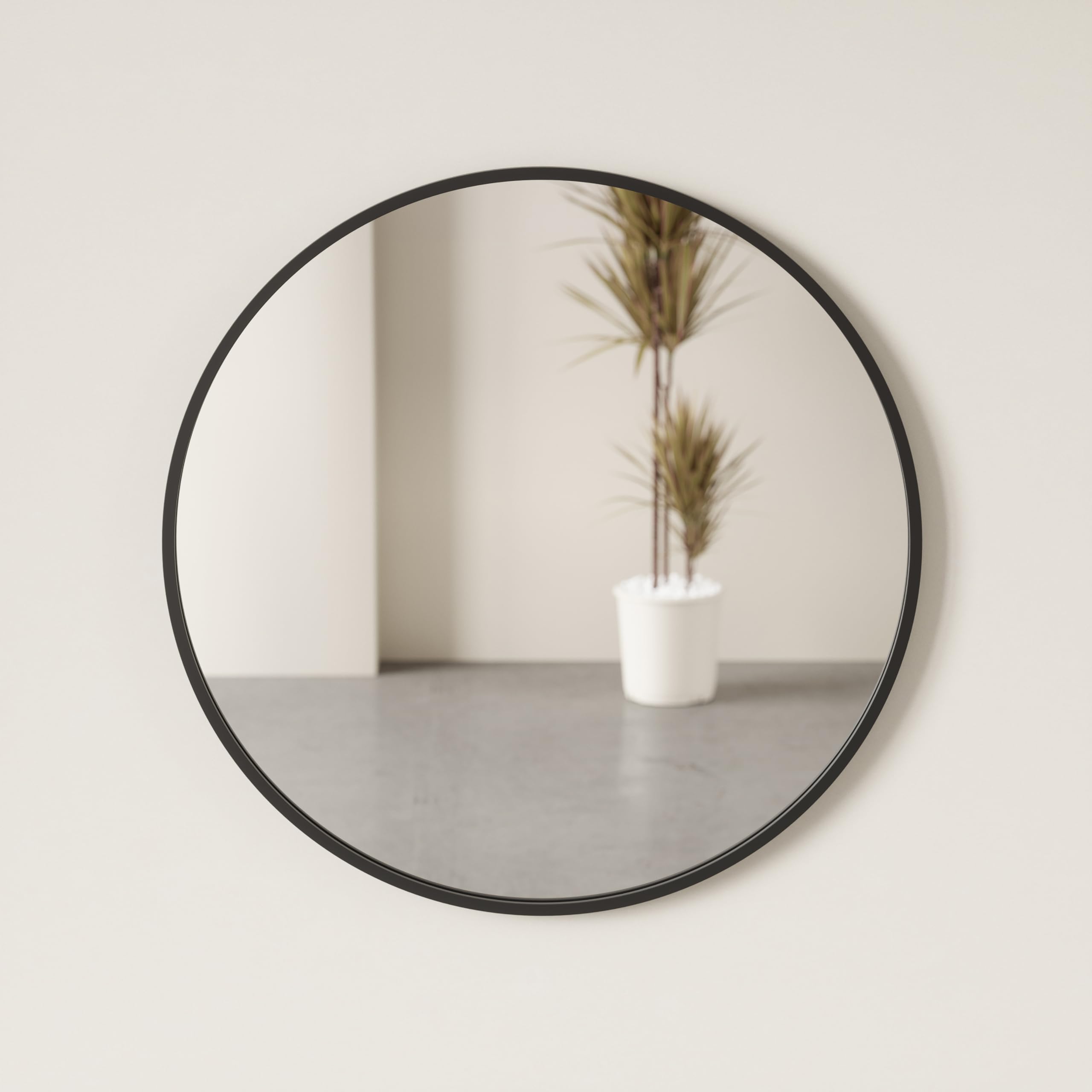 Umbra Hub above fireplace reflecting room for cohesive decor