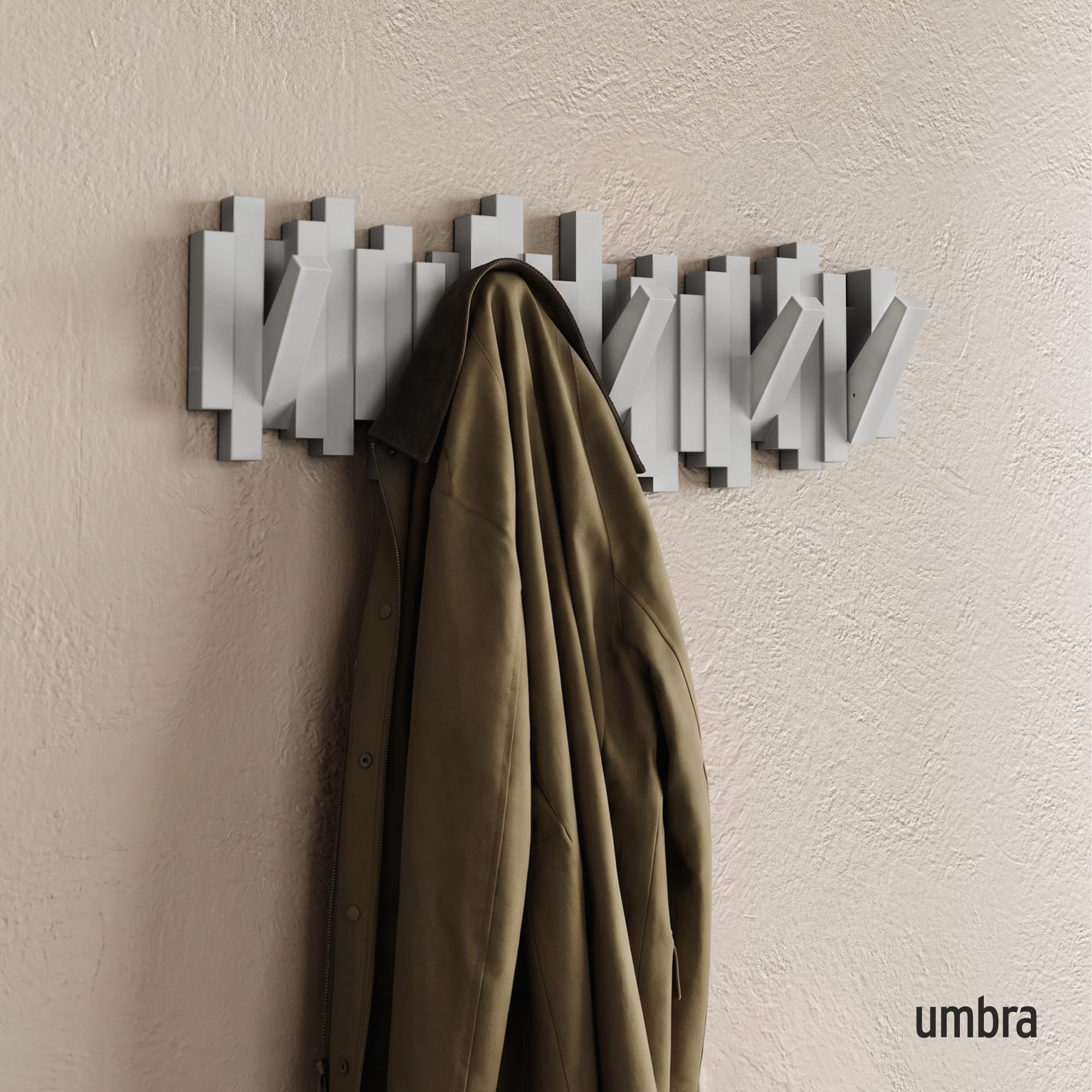 Umbra Sticks close-up of retractable hooks highlighting durable molded design and easy use