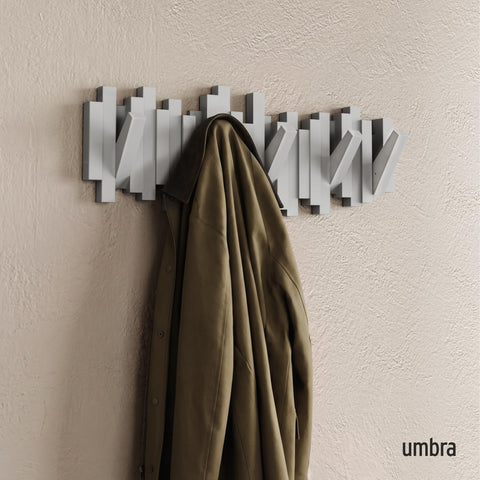 Umbra Sticks close-up of retractable hooks highlighting durable molded design and easy use
