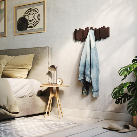 Umbra Sticks in espresso in a living space blending style and function