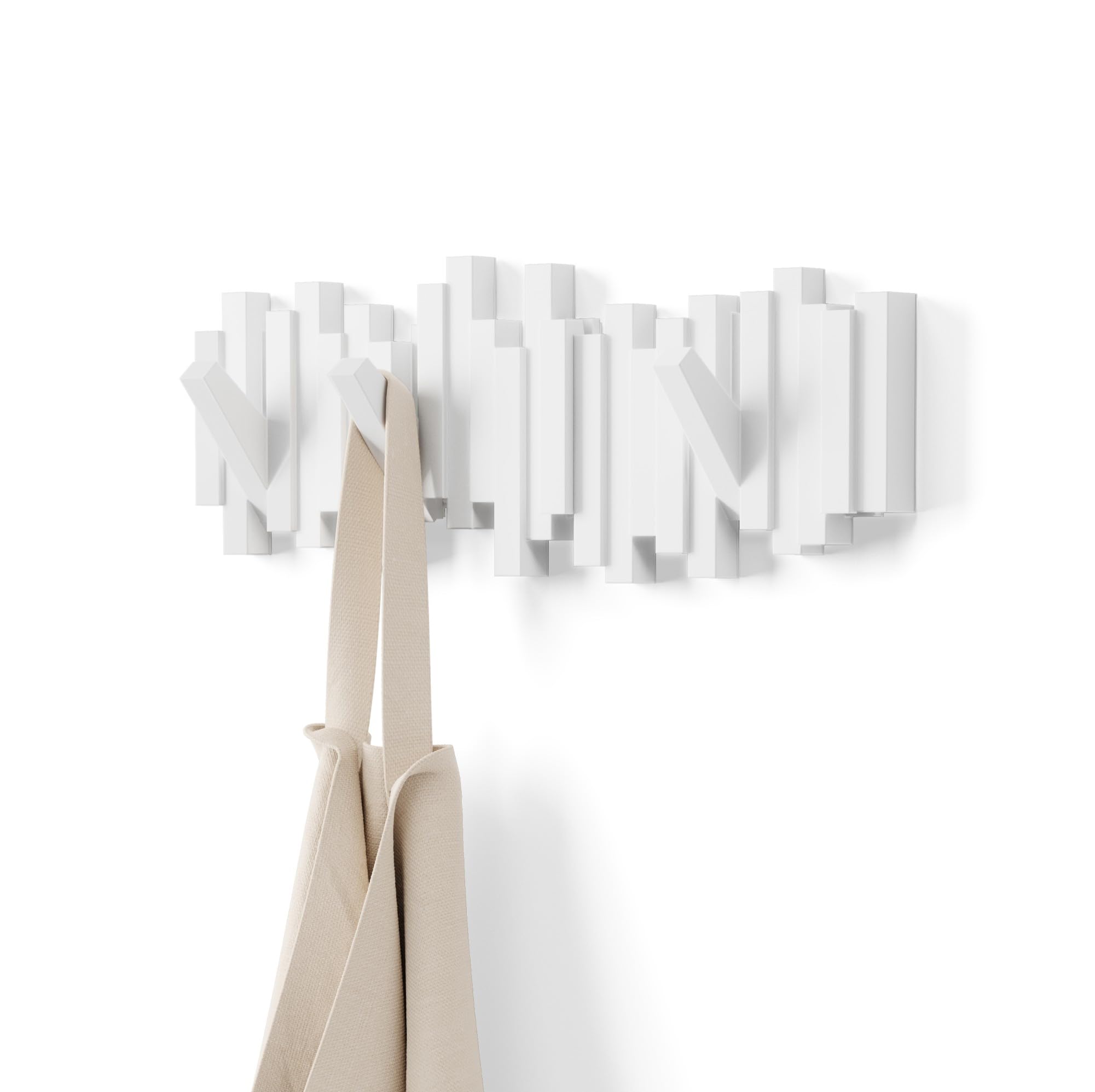 Umbra Sticks front view showing sculptural white design and tidy aesthetic benefit