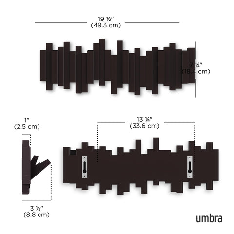 Umbra Sticks with pegs retracted showing clean minimalist wall look