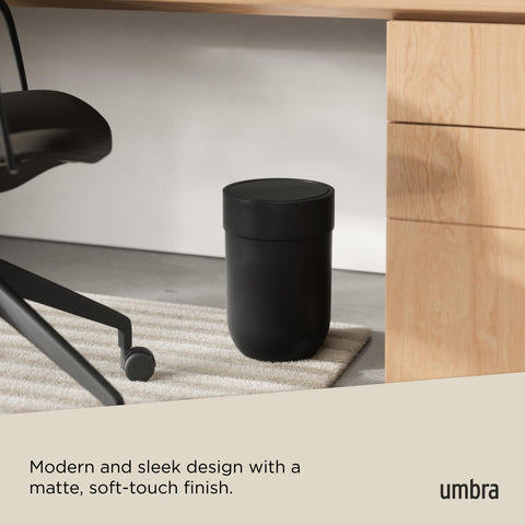 Umbra Touch placed beside bathroom sink showing space-saving benefit