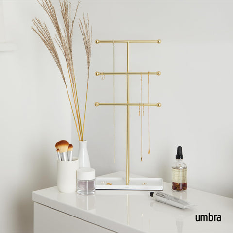Umbra Trigem base detail with accessory dish and padded underside protecting surface