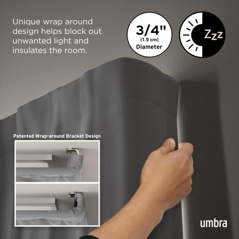 Umbra Twilight in bedroom lifestyle with blackout curtains creating a dark restful environment