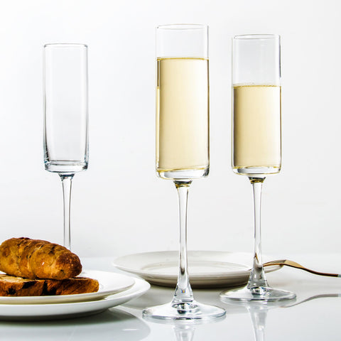 UMEIED twelve champagne flutes arranged on table for a party, elegant presentation