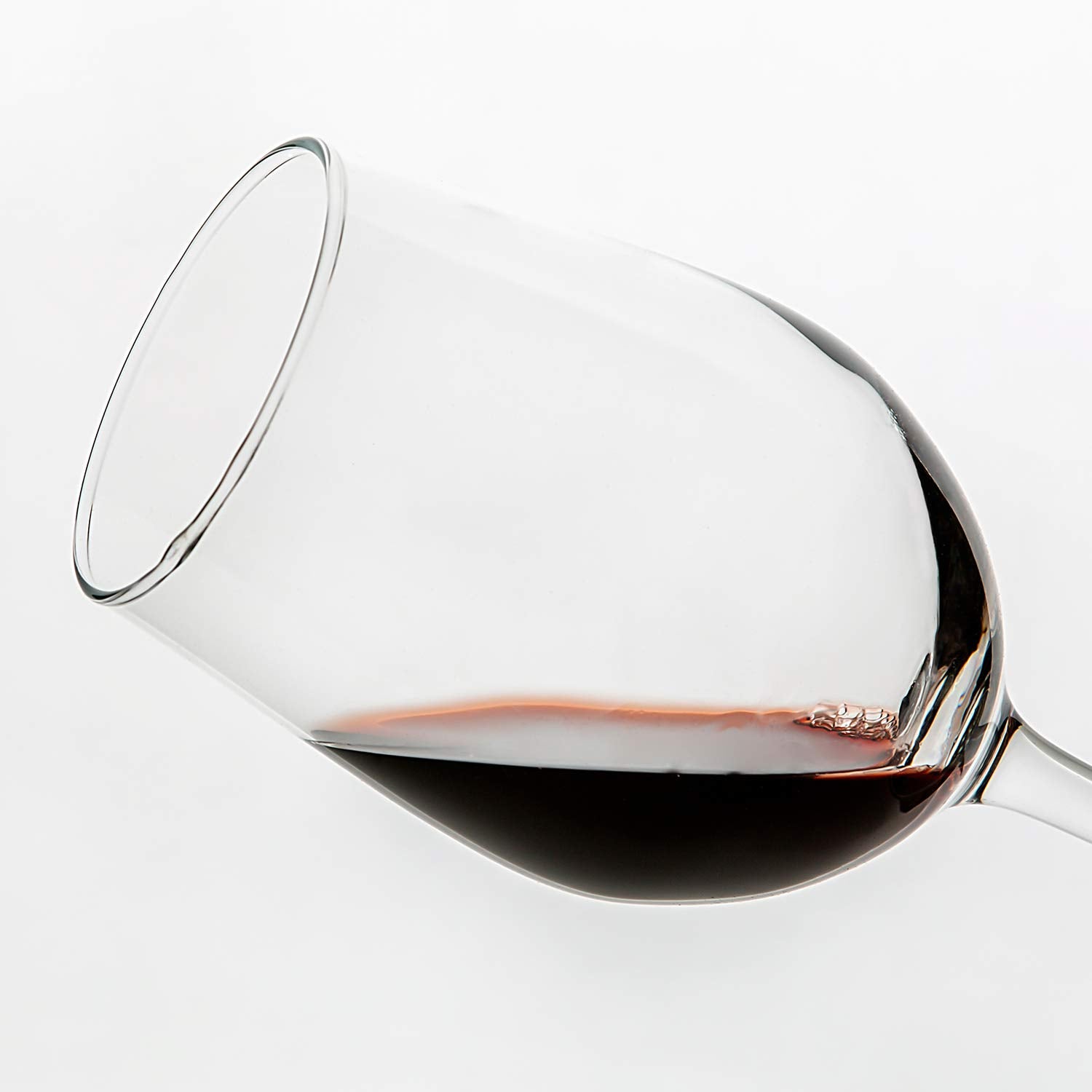 UMI UMIZILI glass in use with wine pour demonstrating elegant presentation