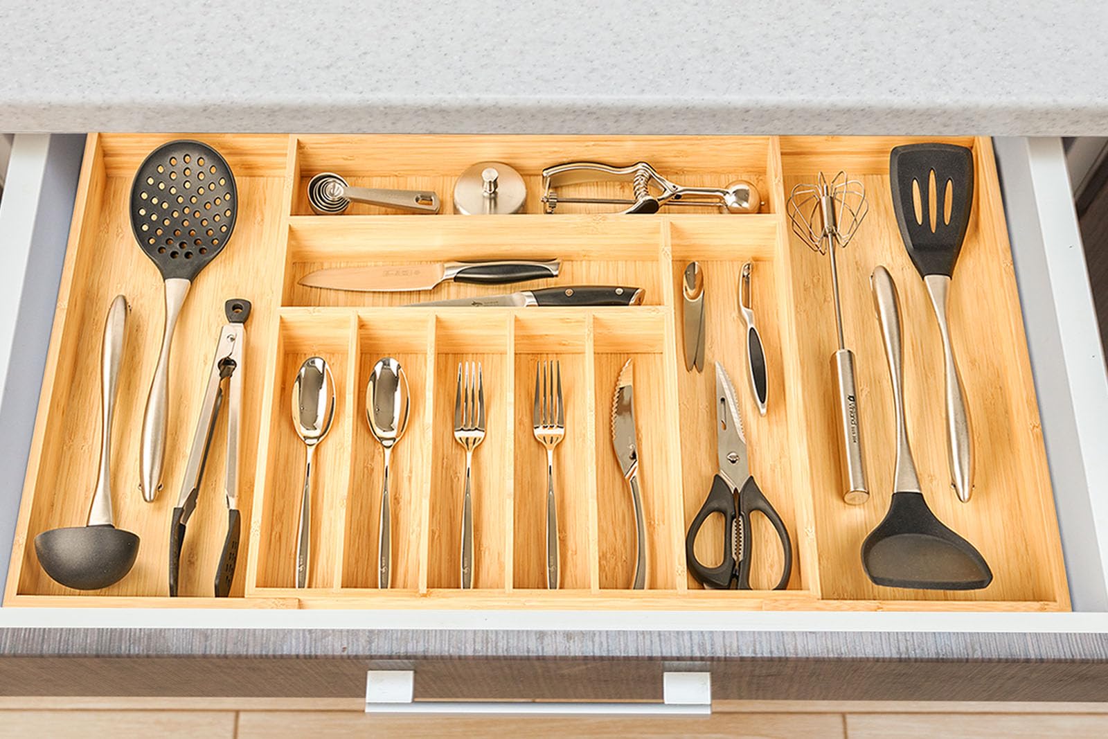 Organizer in kitchen drawer on countertop showing tidy, stylish storage benefit