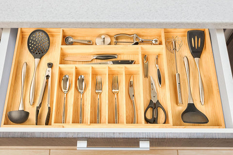 Organizer in kitchen drawer on countertop showing tidy, stylish storage benefit