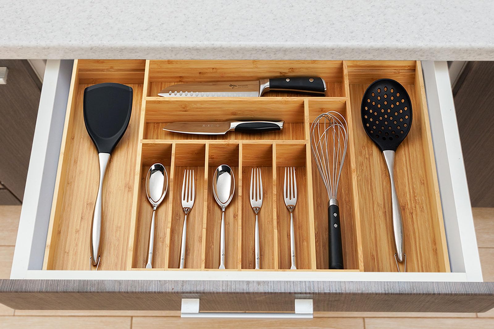 Umilife organizer next to ruler demonstrating 19-inch depth and adjustable width for fit