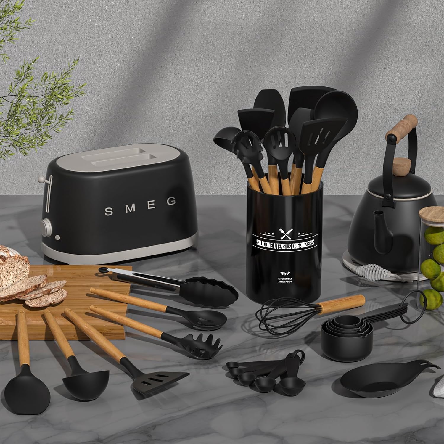 Umite Chef close-up of silicone spatula and slotted spoon protecting nonstick surfaces