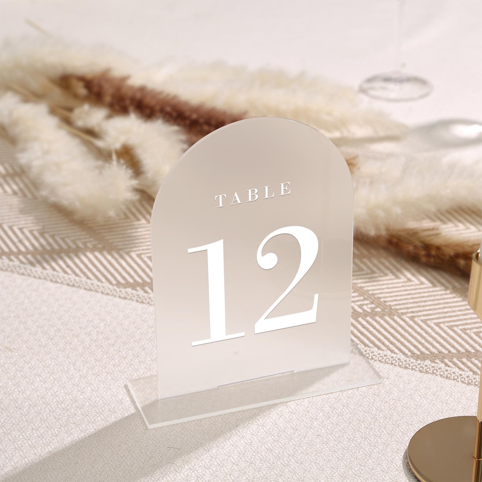 UNIQOOO table setting with number among centerpiece showing cohesive event styling