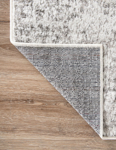Unique Loom in bedroom setting illustrating cozy layered style and warm visual anchor