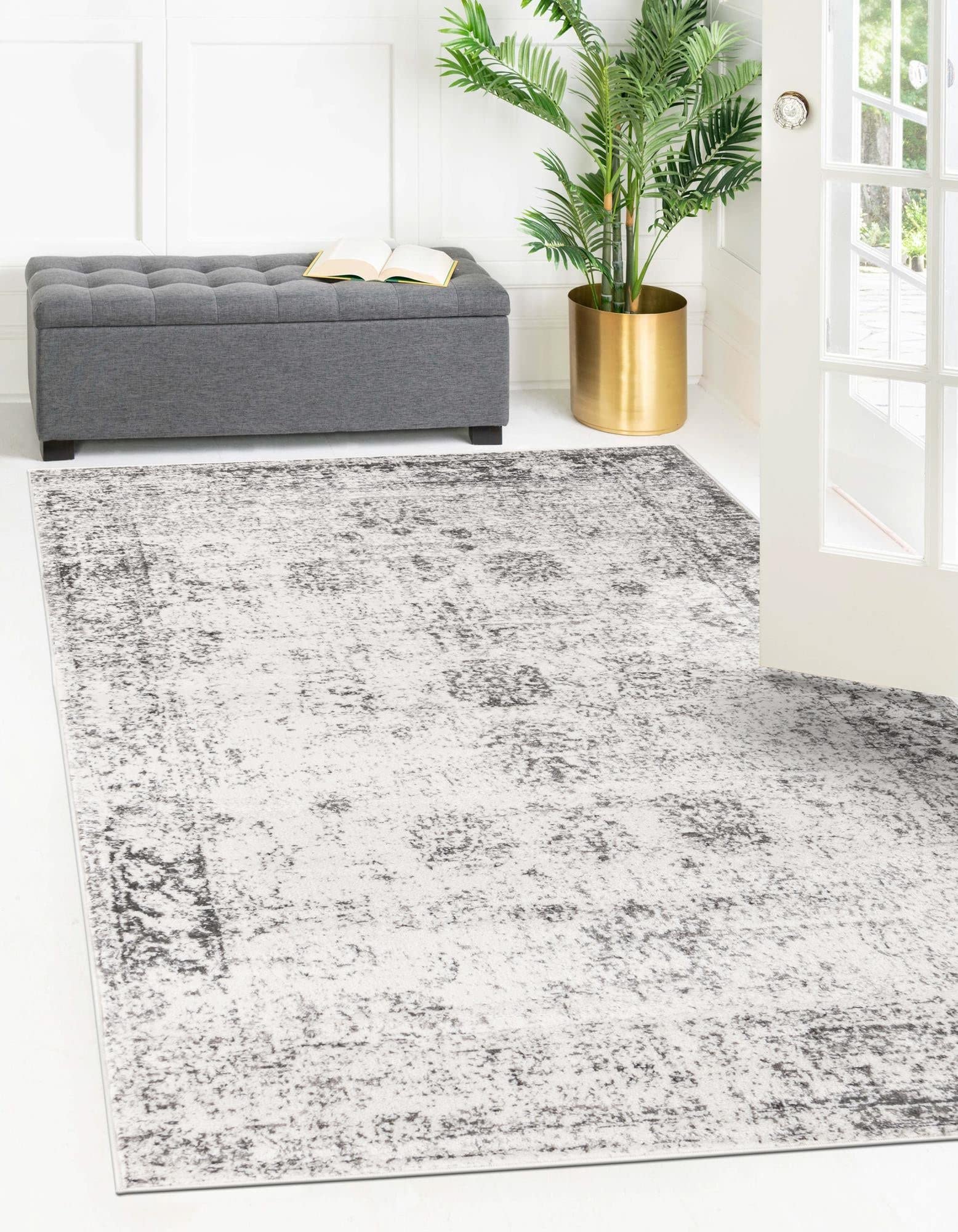 Unique Loom rug in living room setting, anchors seating area with vintage charm