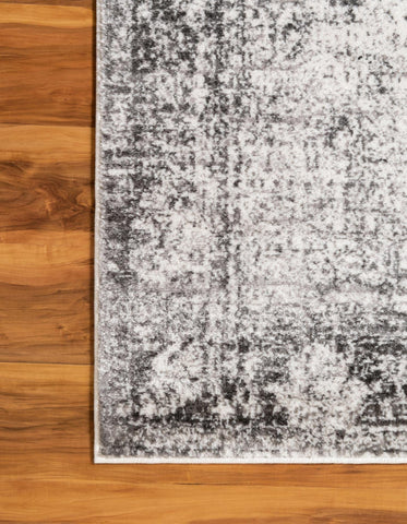 Unique Loom rug under dining table, defines dining space and protects floors