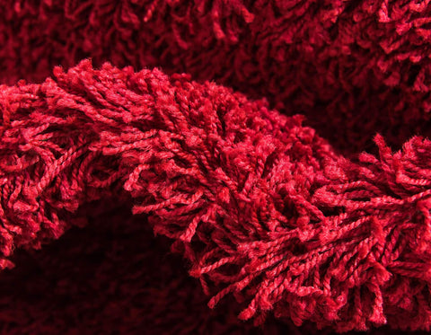 Unique Loom under coffee table demonstrating focal-point styling benefit