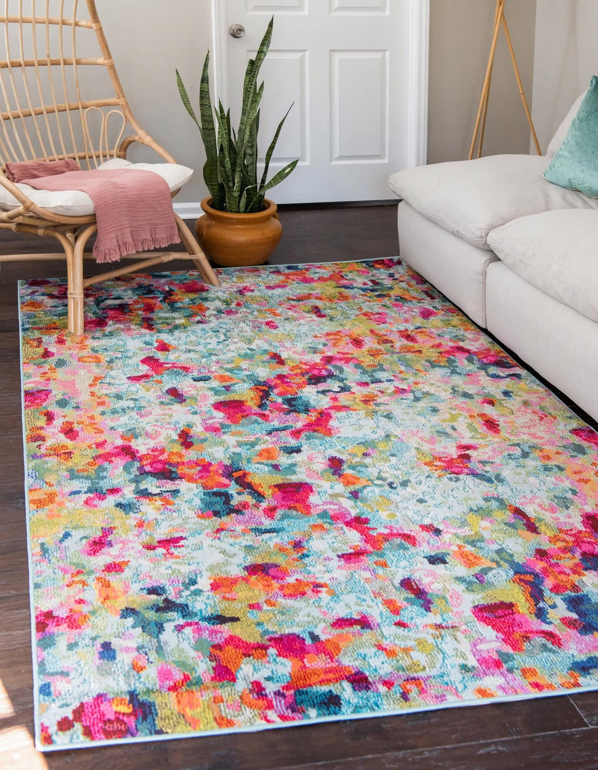 Unique Loom front view showing Champagne blue abstract rug brightening a living room