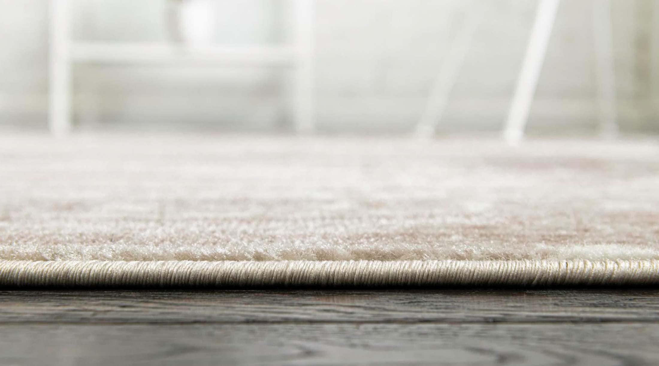 Unique Loom corner showing 100% jute backing protecting hardwood floors