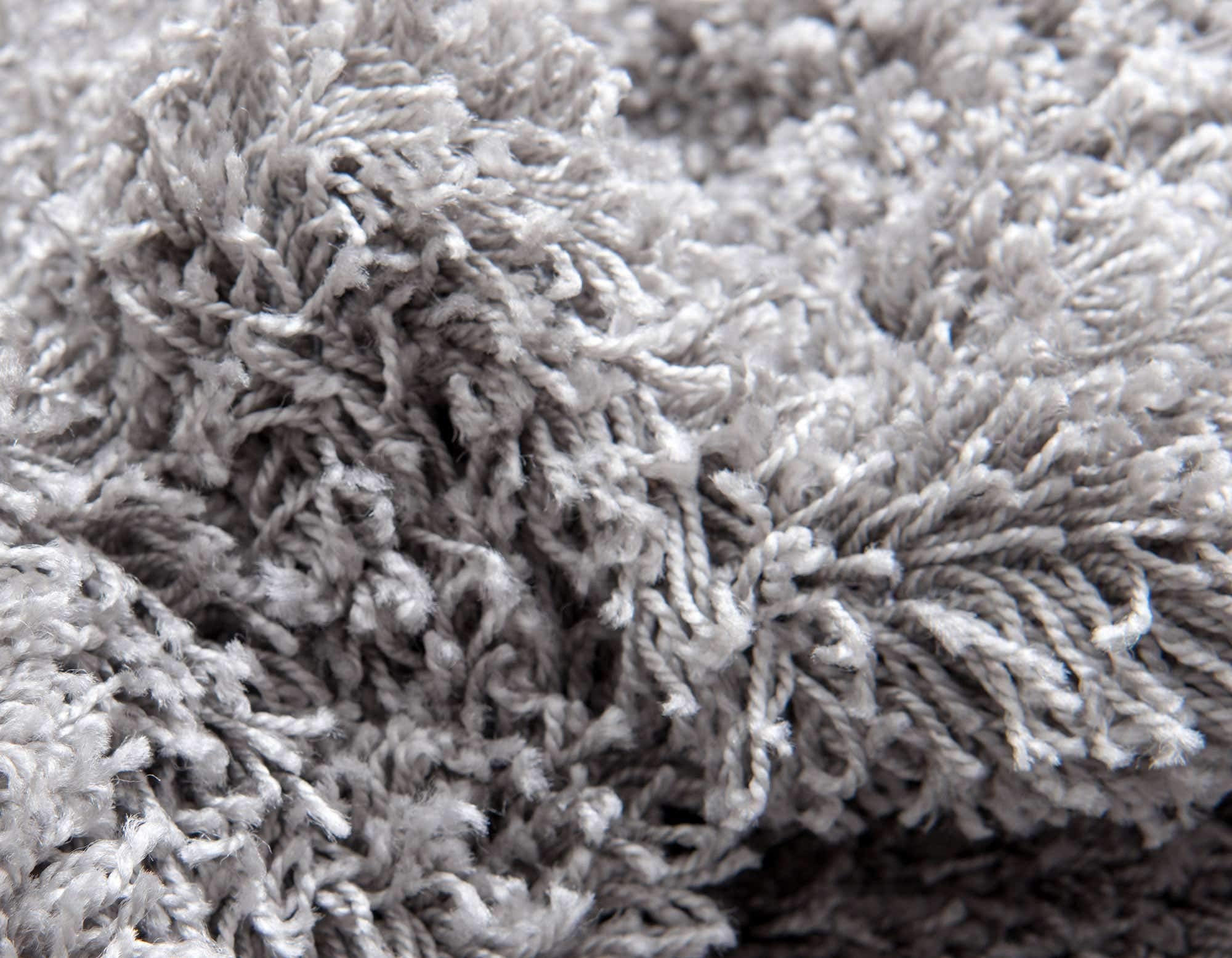 Unique Loom family on rug in playroom showing soft surface for activities