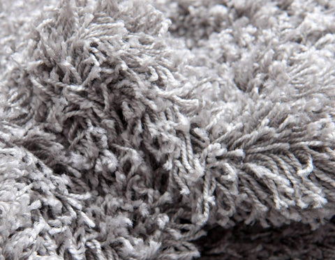 Unique Loom family on rug in playroom showing soft surface for activities