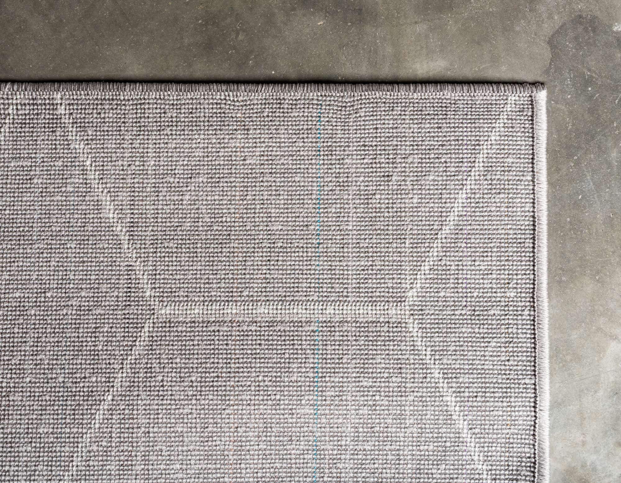 Unique Loom with a dog on rug highlighting pet-friendly durability and comfort