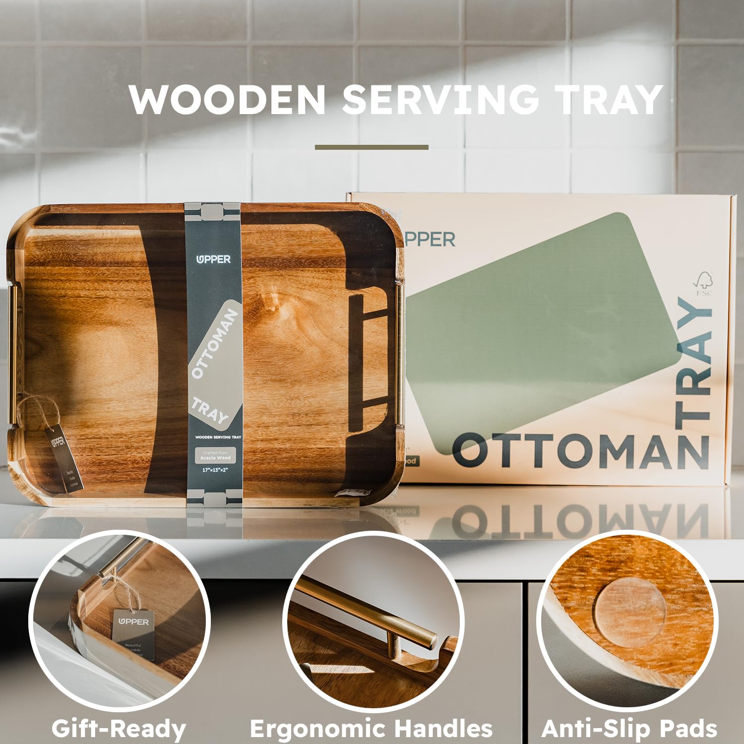 Upper tray gold handle close-up highlighting sturdy grip and elegant accent