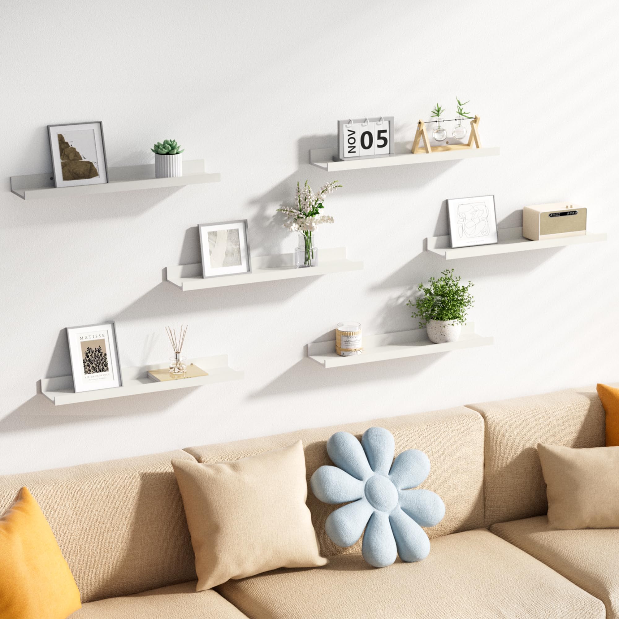upsimples styled in living room with plants and frames for attractive display benefit