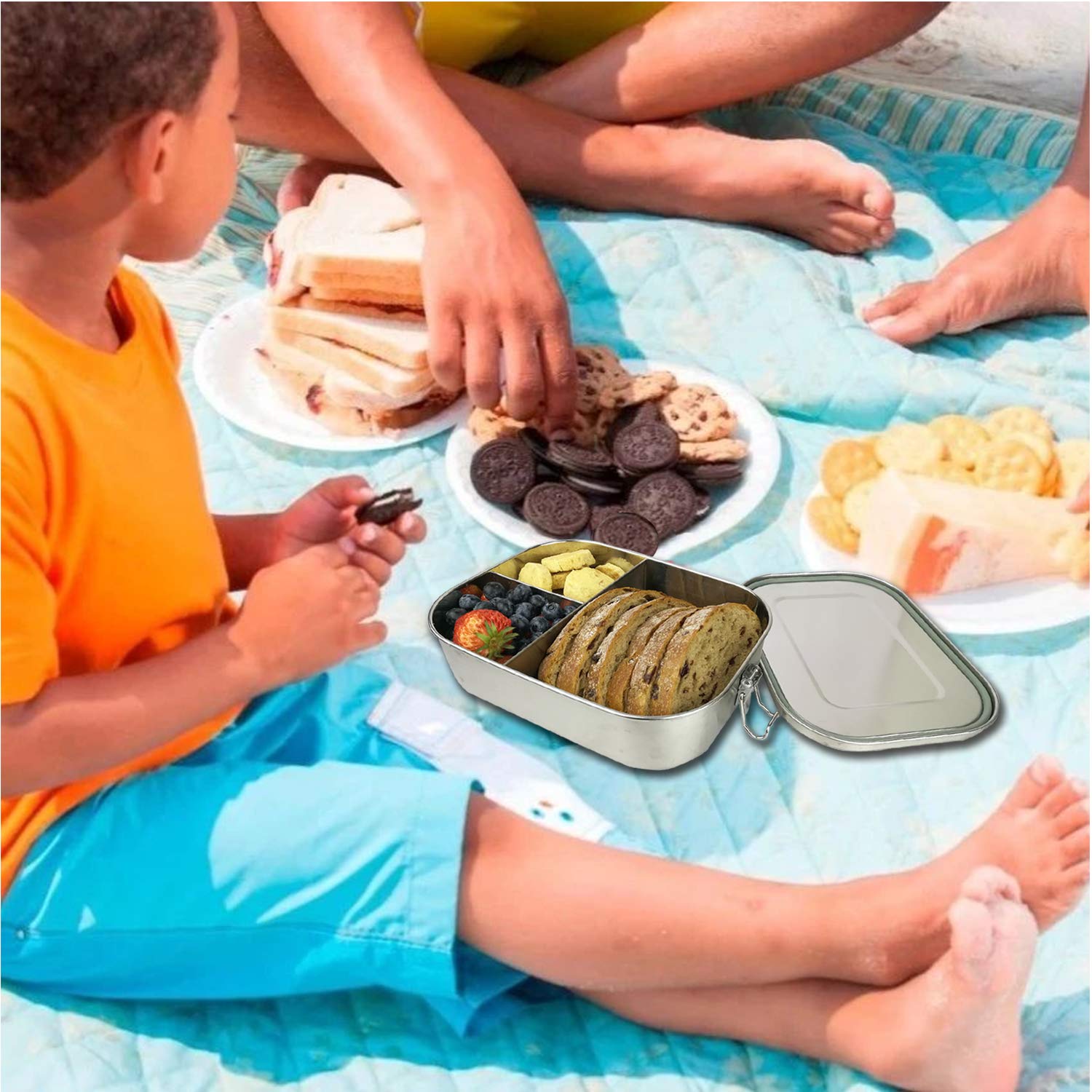 UPTRUST on picnic blanket showing durable, reusable lunch solution