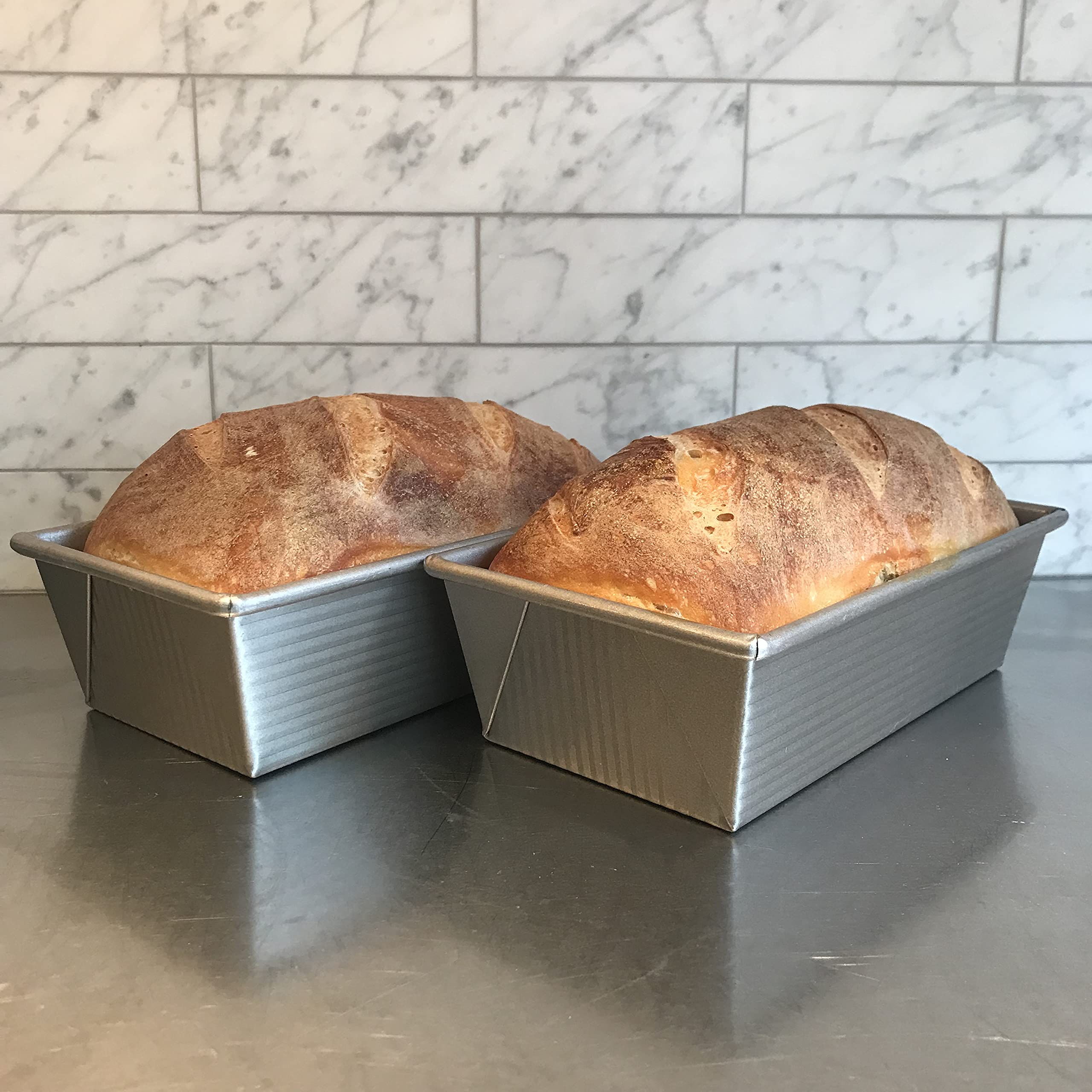 USA Pan with freshly baked loaf showing even browning and professional crust