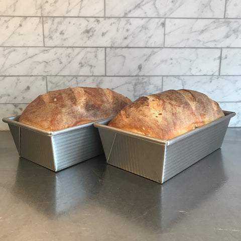 USA Pan with freshly baked loaf showing even browning and professional crust