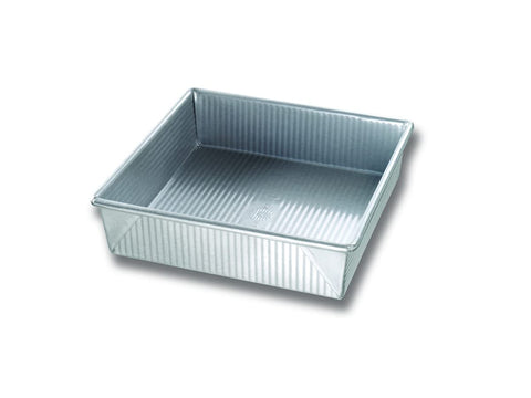 USA Pan front view of 9-inch square pan showing durable finish and even baking benefit