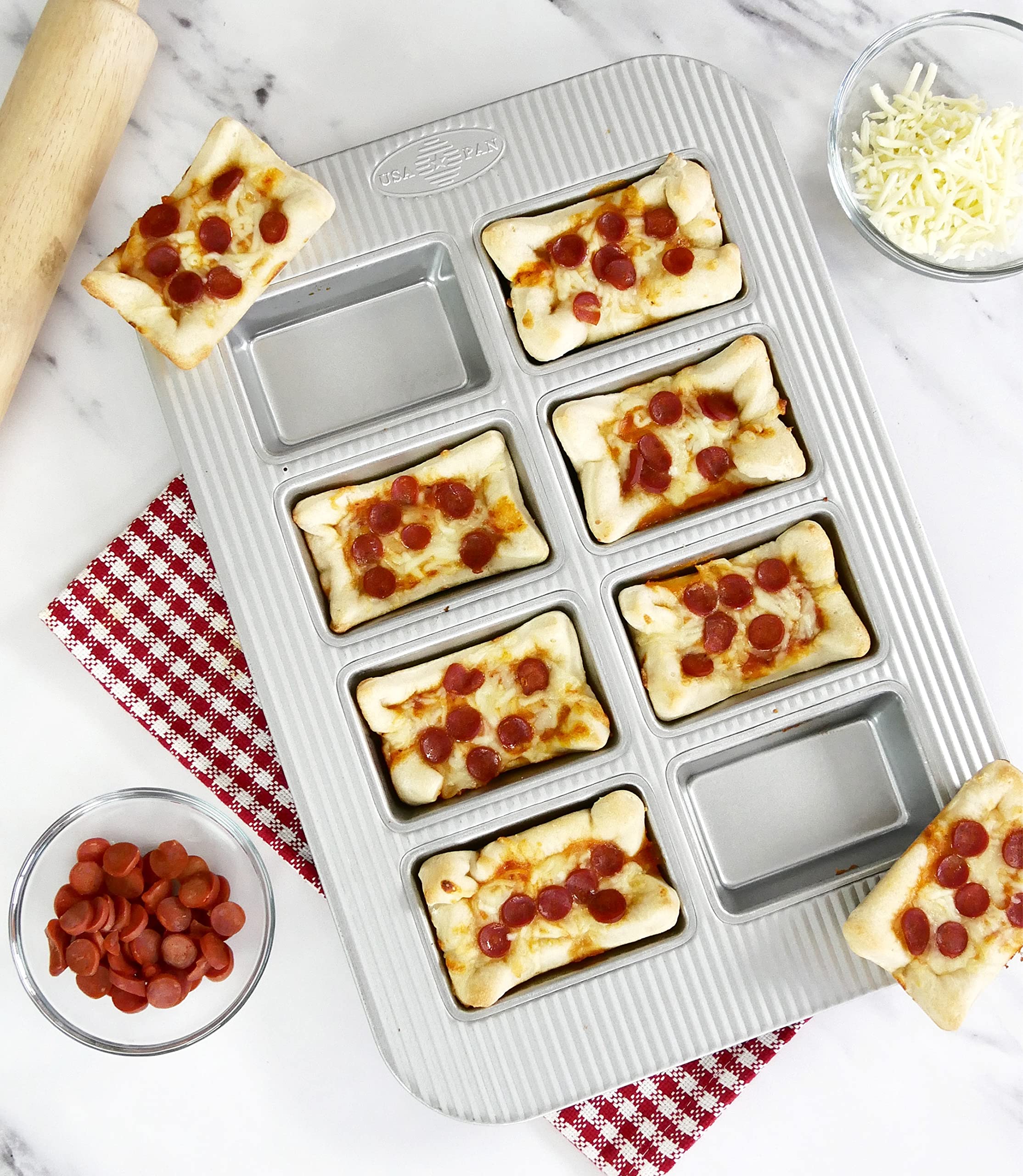 USA Pan filled mini loaves in pan demonstrating clean release and perfect portioned servings