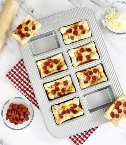 USA Pan filled mini loaves in pan demonstrating clean release and perfect portioned servings