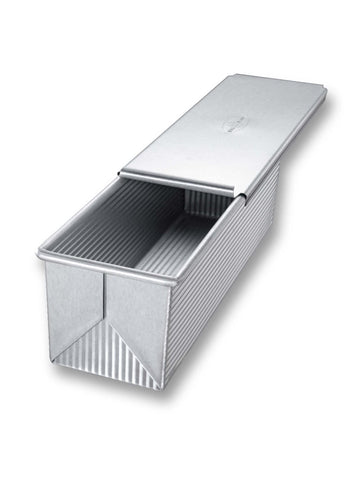 USA Pan Pullman loaf with cover closed showing flat-top shaping for uniform sandwich slices