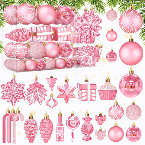 Uspring ornaments styled on holiday table setting showing elegant pink theme