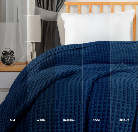 Utopia Bedding navy waffle blanket draped over sofa for stylish, everyday use