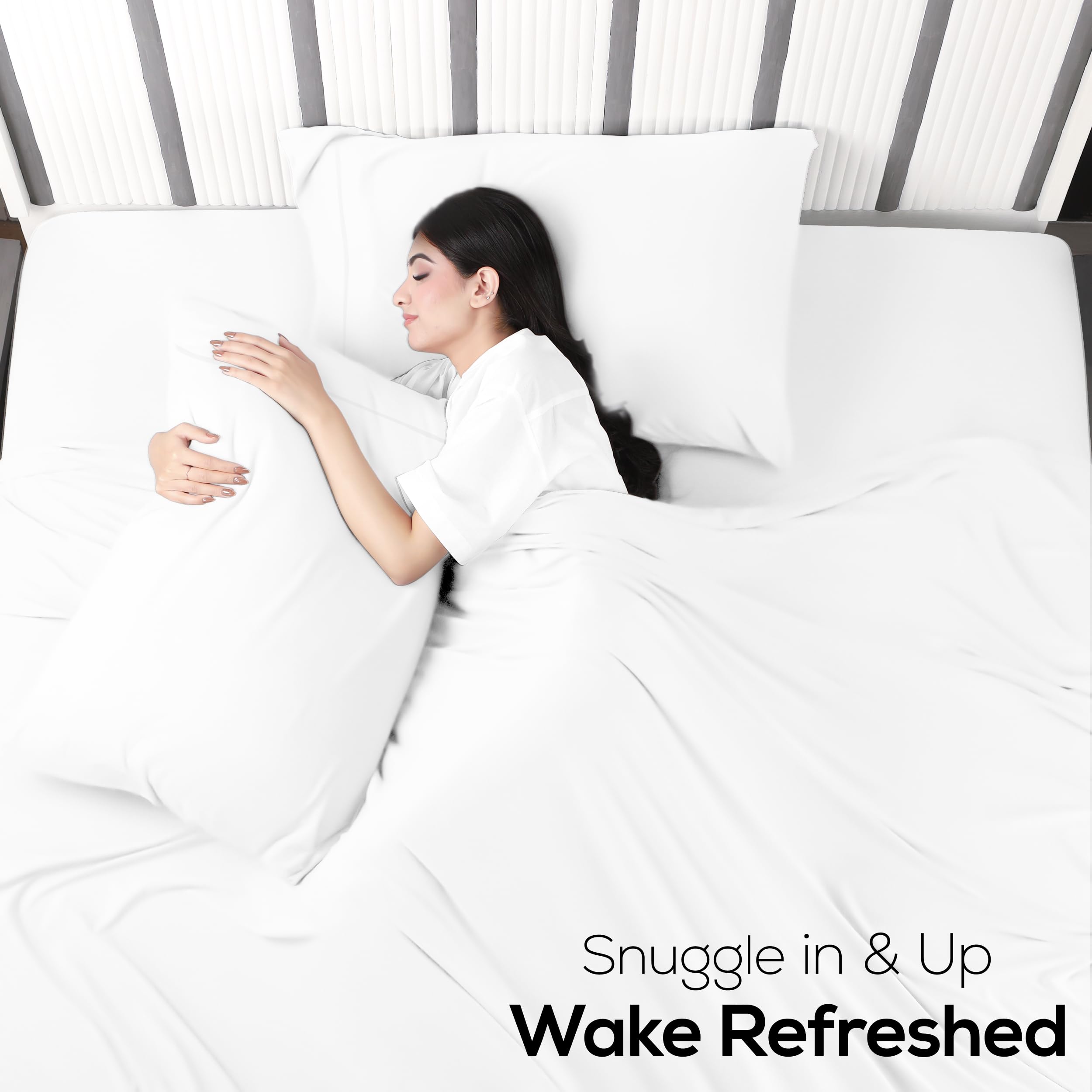 Utopia Bedding fabric stretch demo pulled to show elasticity and reduced bunching benefit