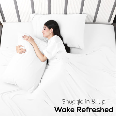 Utopia Bedding fabric stretch demo pulled to show elasticity and reduced bunching benefit